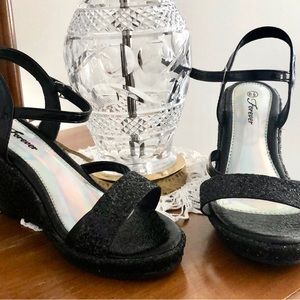 Black glittery party shoes.